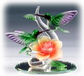 Glass Hummingbirds On Rose